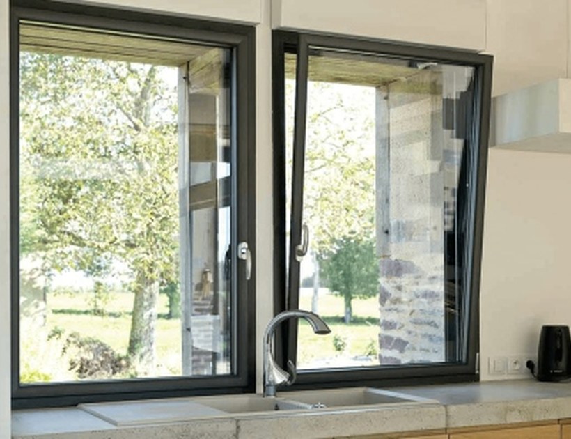 PRM-50 Series aluminum tilt-turn window in kitchen with garden view