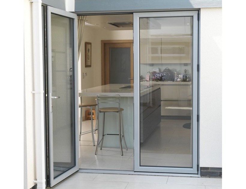 PRM-50 Series aluminum casement door open to garden courtyard