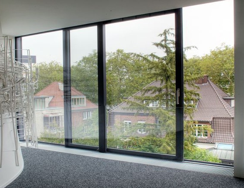 PRM-73 Series aluminum sliding window floor-to-ceiling with rooftop village view