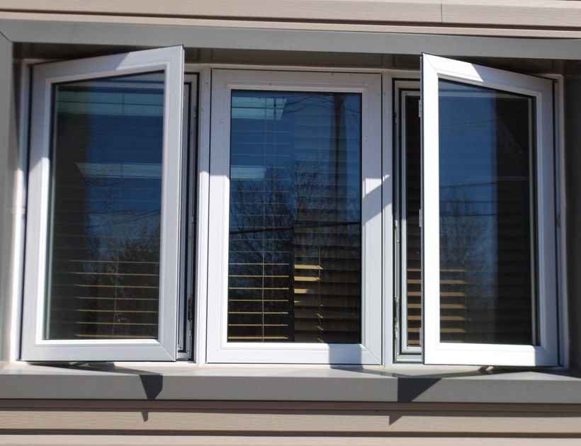 PRM-81 Series thermal-break aluminum casement window on house exterior