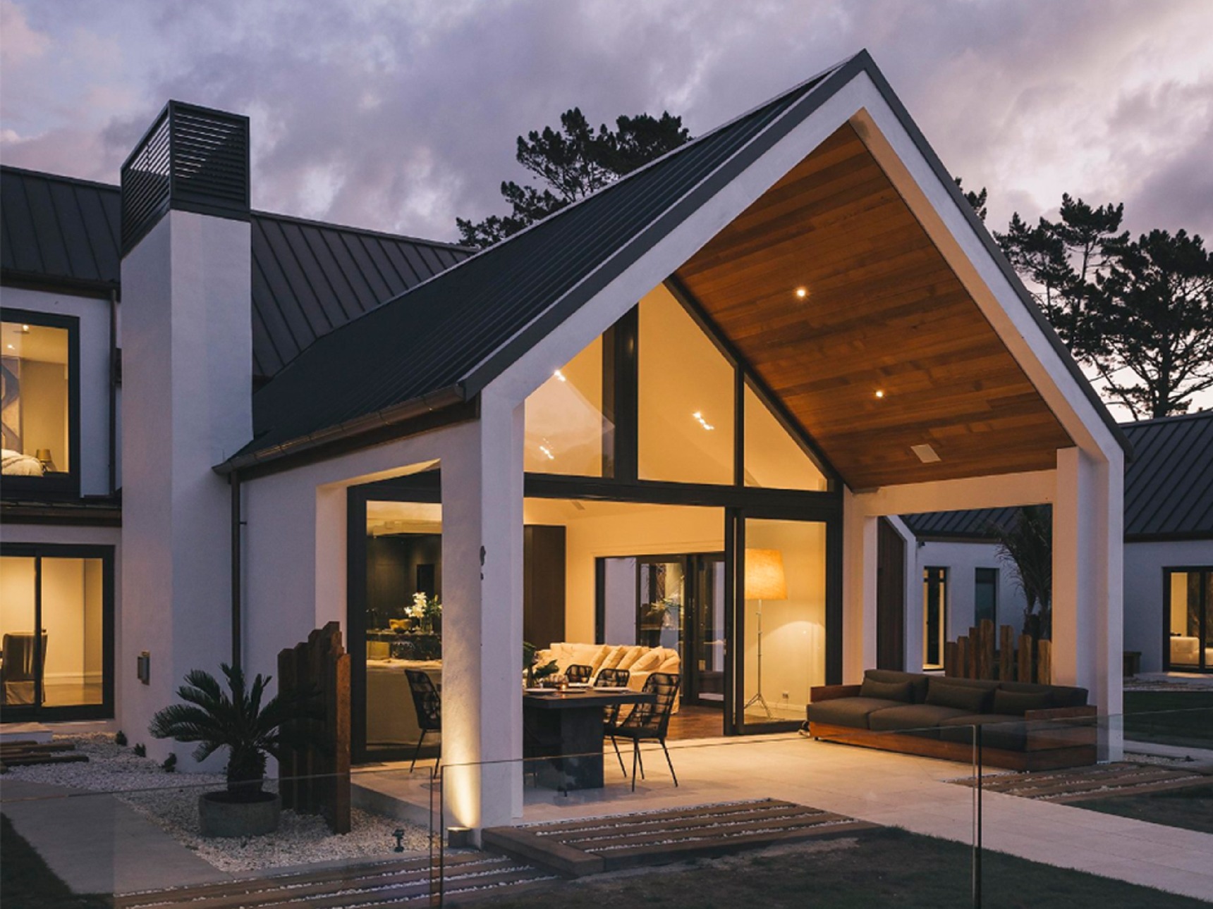 LD-X76 Series thermal-break aluminum patio door on a modern home exterior
