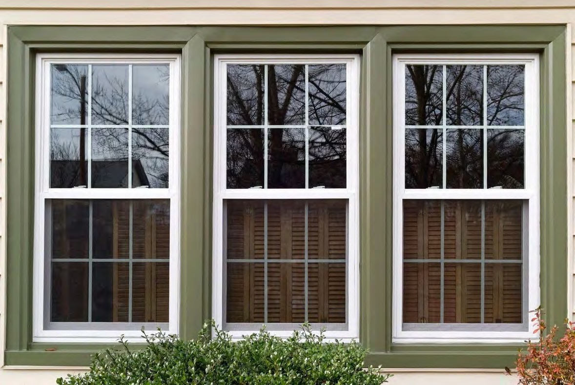 Home exterior with single and double hung uPVC windows