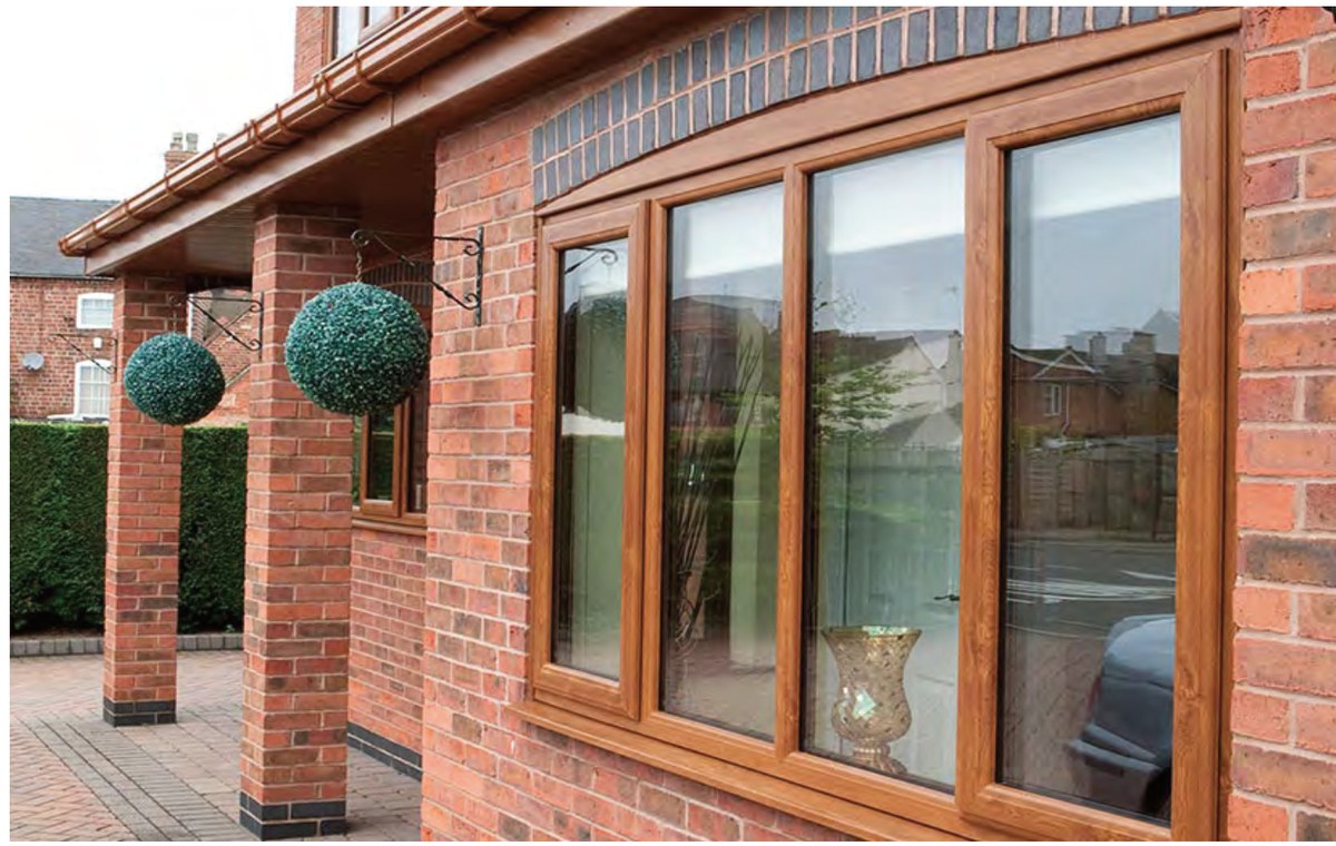 PRM-70 Series uPVC casement window on stone house exterior