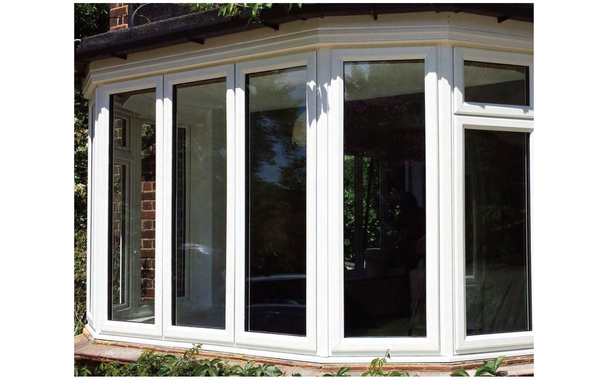 PRM-72 Series uPVC casement windows in sage green on rendered house exterior