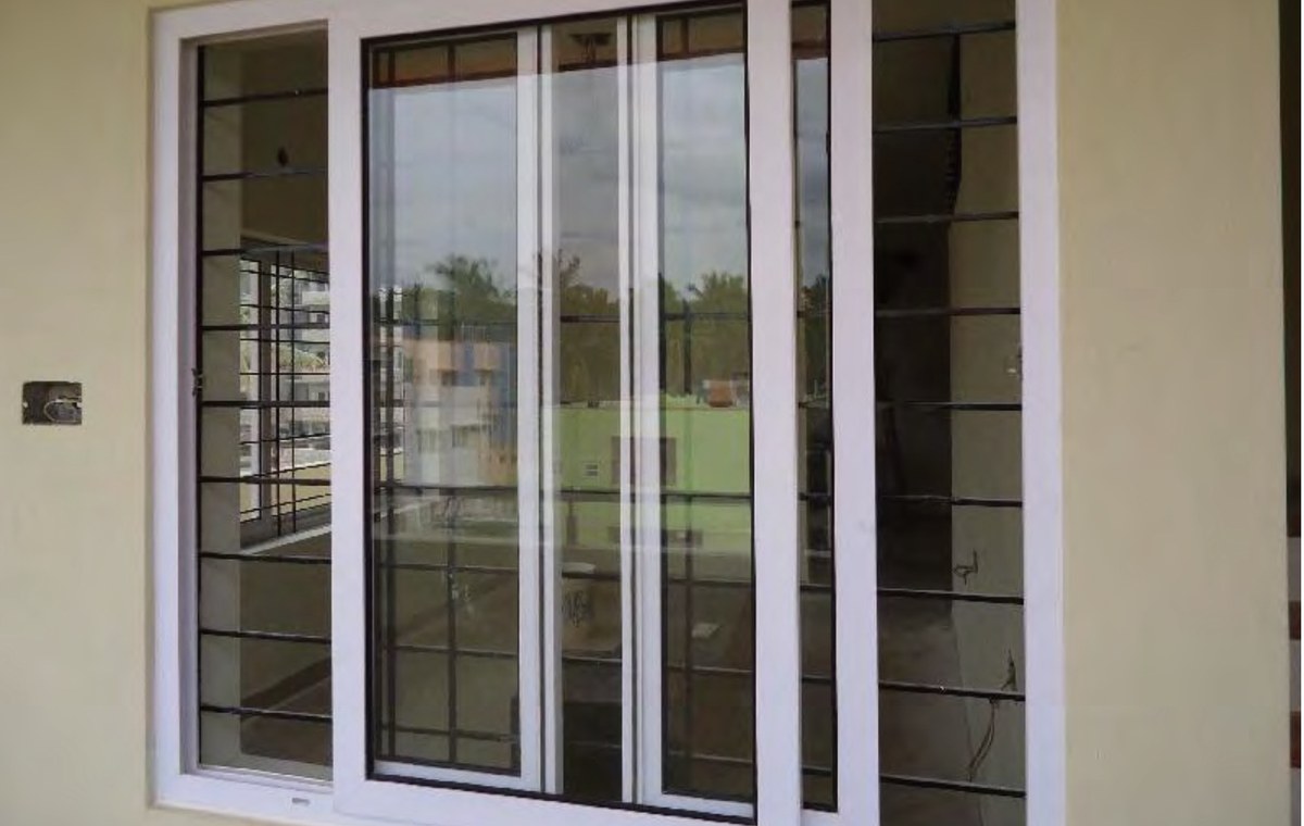 PRM-80 Series uPVC windows installed on residential brick house exterior