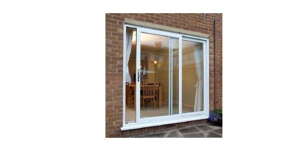 White uPVC sliding window on brick house exterior